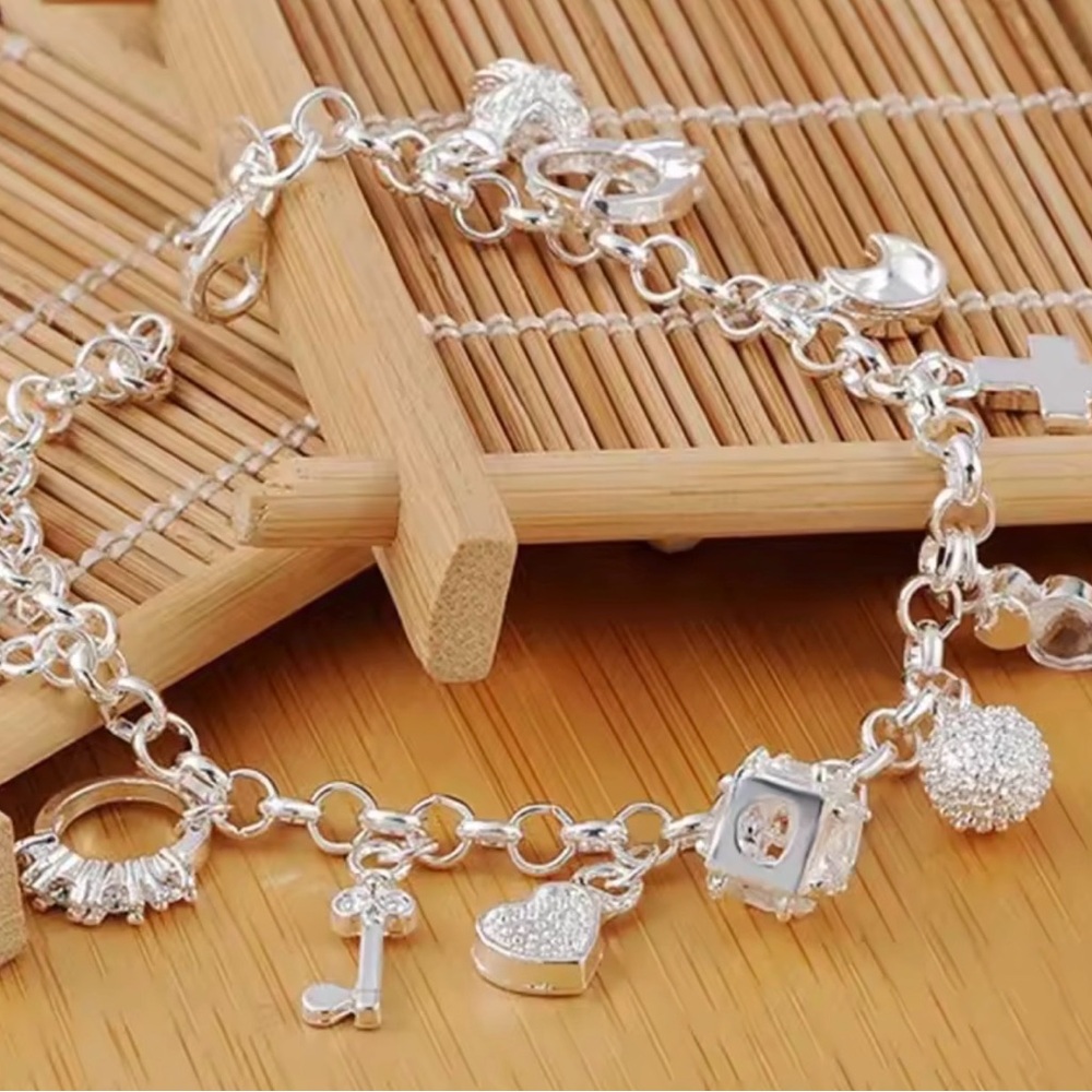 .925 Sterling Silver 13 Charms Bracelet - Picture 6 of 8